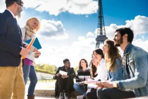Students on a tourism study trip in Paris, Eiffel Tower in background