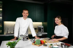 medium-shot-smiley-people-kitchen (1) Hospitality & Gastronomy